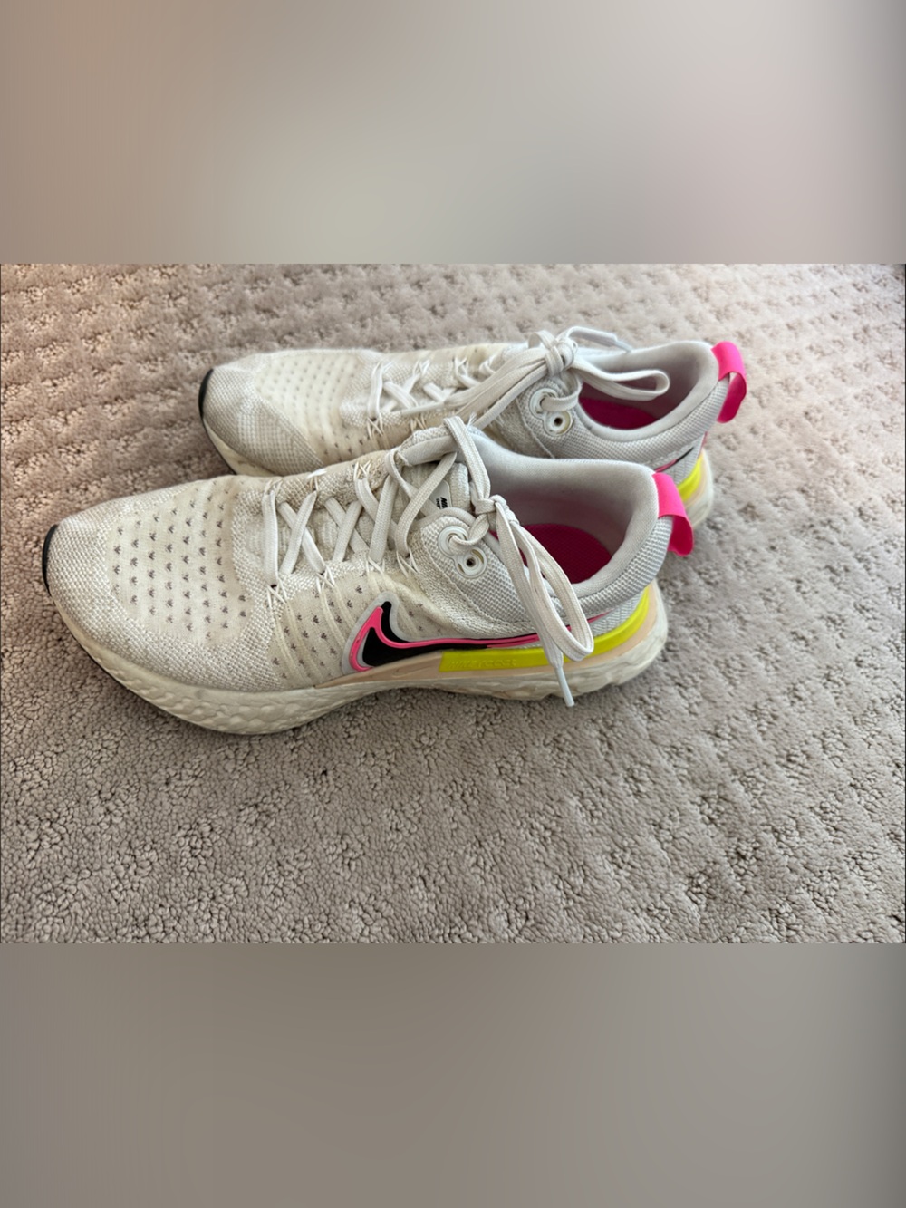 Nike White Women's Running Sneakers with Pink and Yellow Accents